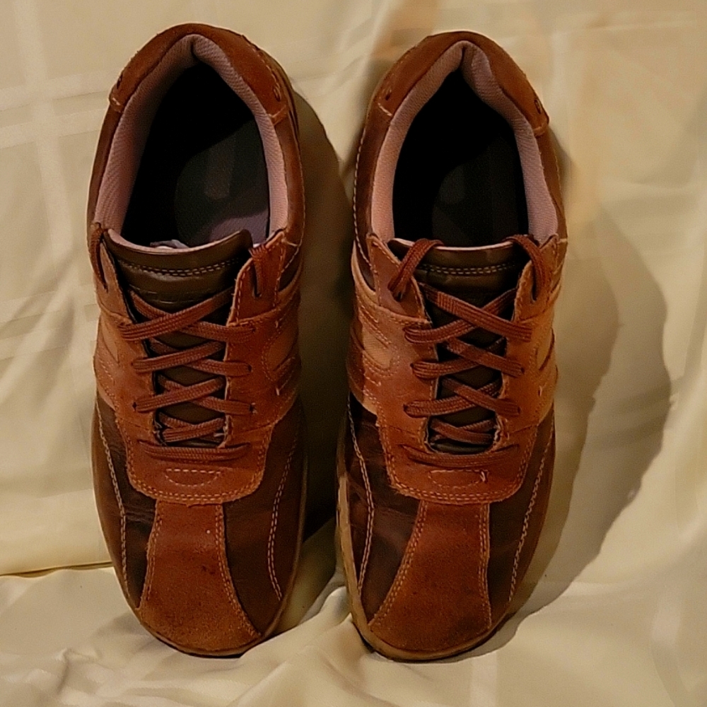 Skechers casual athletic shoes.  Brown/Tan in color.